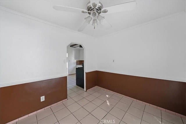 1745 College View Pl, Los Angeles, CA 90041 - unfurnished room featuring crown molding, a ceiling fan, arched walkways, and light tile patterned floors