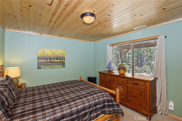bedroom with visible vents, light carpet, and wooden ceiling