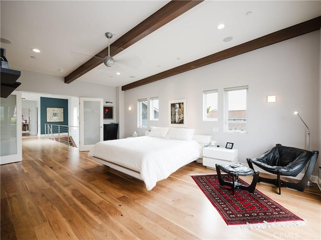 bedroom with beam ceiling, wood finished floors, ceiling fan, and recessed lighting