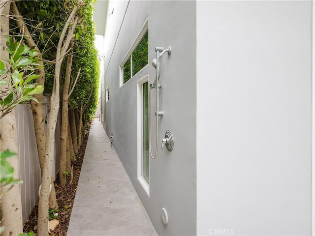 exterior space with stucco siding