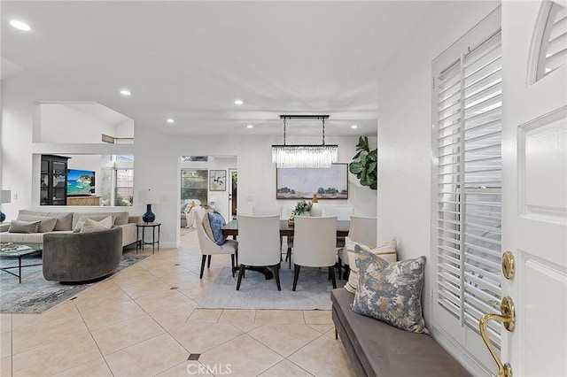 dining room featuring an inviting chandelier, recessed lighting, and light tile patterned flooring