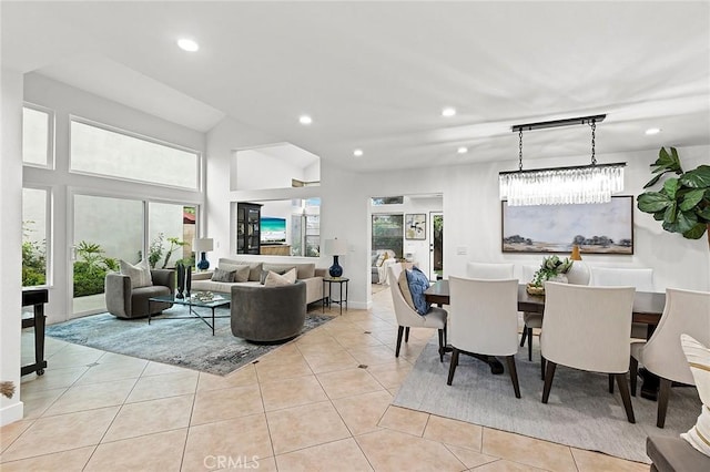 dining room featuring recessed lighting, light tile patterned floors, and a healthy amount of sunlight