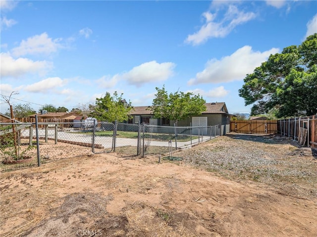 view of yard with a gate and fence private yard