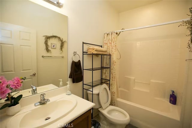 bathroom with vanity, toilet, and shower / tub combo