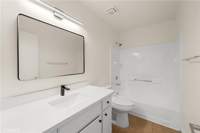 full bathroom with shower / tub combination, tile patterned flooring, vanity, toilet, and visible vents