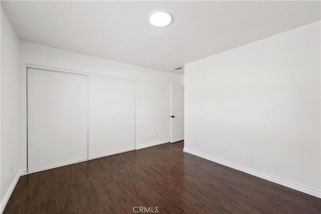 12584 Atwood Ct Unit 1215, Rancho Cucamonga, CA 91739 - unfurnished bedroom featuring wood finished floors, baseboards, and a closet