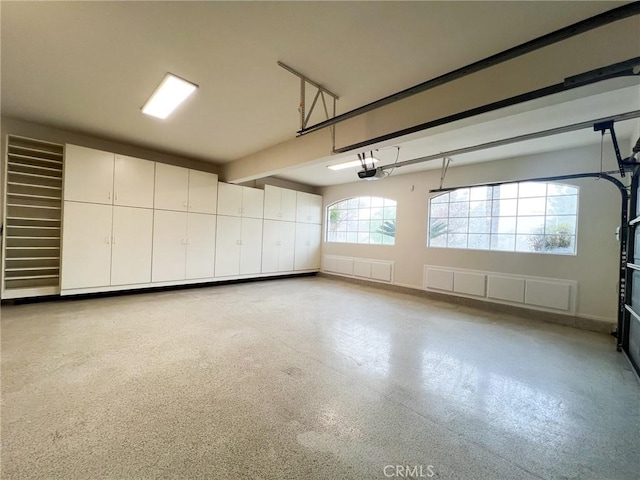 6926 Orozco Dr, Riverside, CA 92506 - garage featuring a garage door opener