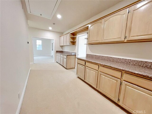 6926 Orozco Dr, Riverside, CA 92506 - kitchen with open shelves, baseboards, light brown cabinets, light carpet, and recessed lighting