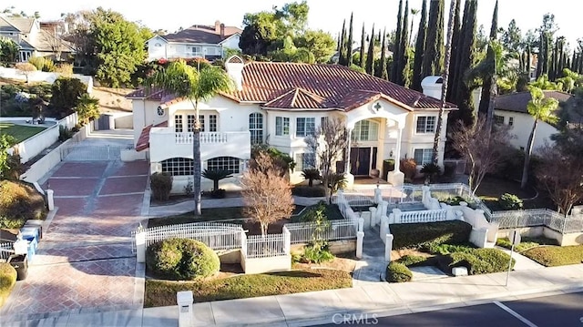6926 Orozco Dr, Riverside, CA 92506 - view of front of home with stucco siding and a tile roof