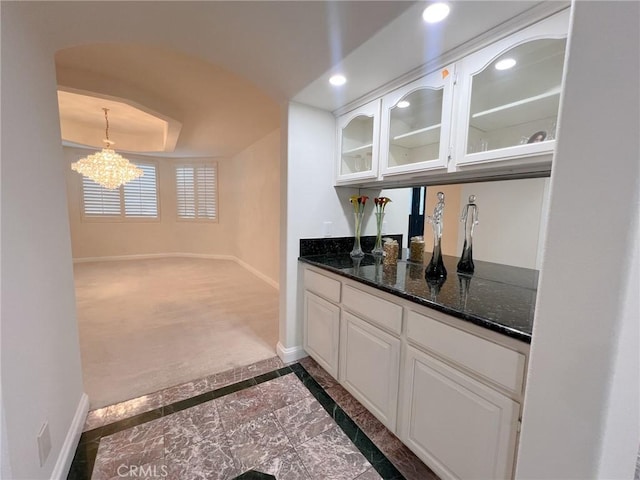 6926 Orozco Dr, Riverside, CA 92506 - bar featuring baseboards, decorative light fixtures, recessed lighting, and a notable chandelier