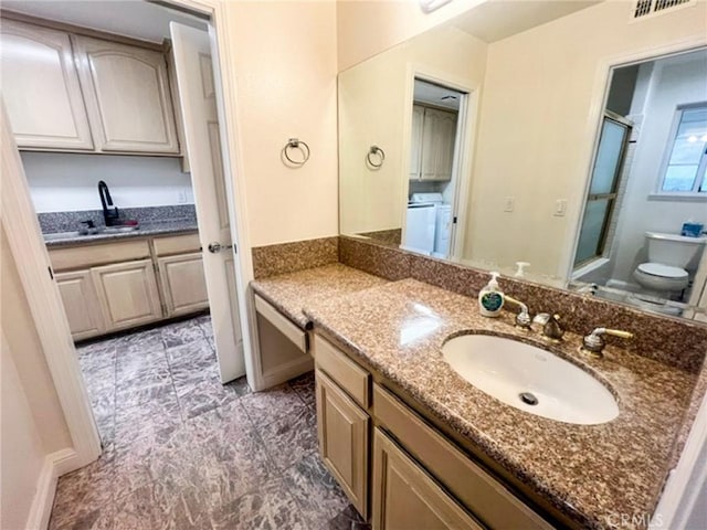 6926 Orozco Dr, Riverside, CA 92506 - bathroom with vanity, a shower with door, visible vents, and toilet
