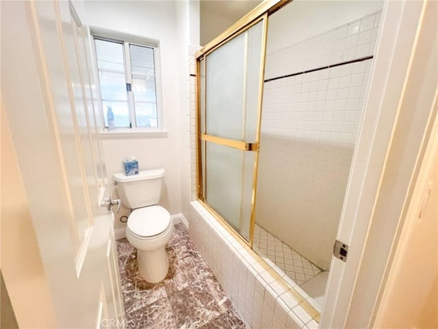 6926 Orozco Dr, Riverside, CA 92506 - full bath with baseboards, tile patterned flooring, a tile shower, and toilet