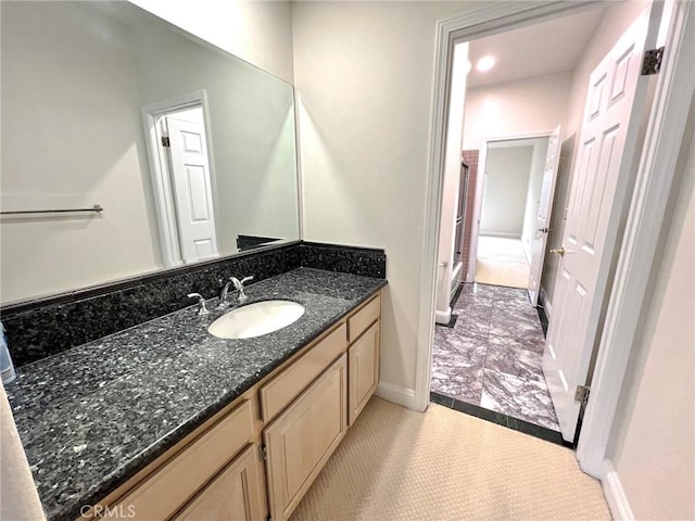 6926 Orozco Dr, Riverside, CA 92506 - bathroom featuring vanity and baseboards