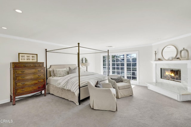 bedroom with light carpet, recessed lighting, baseboards, a high end fireplace, and ornamental molding