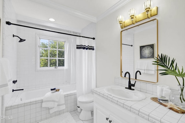 full bathroom featuring crown molding, tile patterned flooring, vanity, tiled shower / bath, and toilet