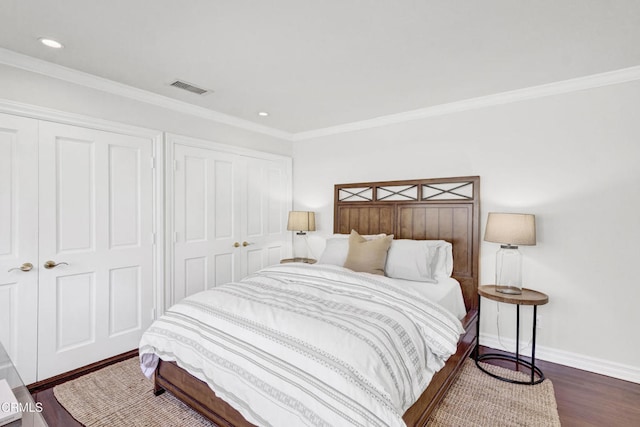 bedroom with visible vents, recessed lighting, baseboards, and dark wood-type flooring