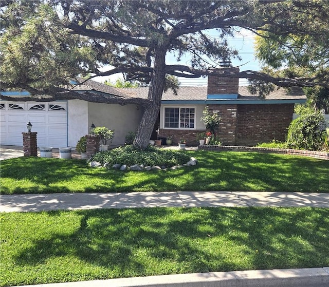 13511 Epping Way, Tustin, CA 92780 - ranch-style home with stucco siding, a front yard, a chimney, brick siding, and an attached garage