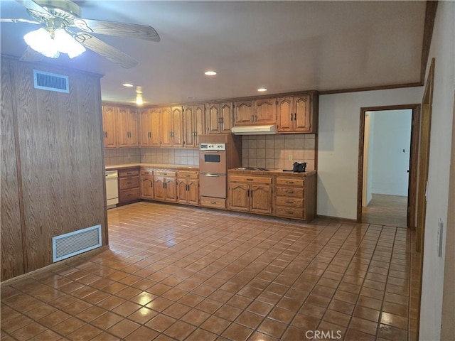 13511 Epping Way, Tustin, CA 92780 - kitchen featuring under cabinet range hood, white appliances, recessed lighting, backsplash, and a ceiling fan