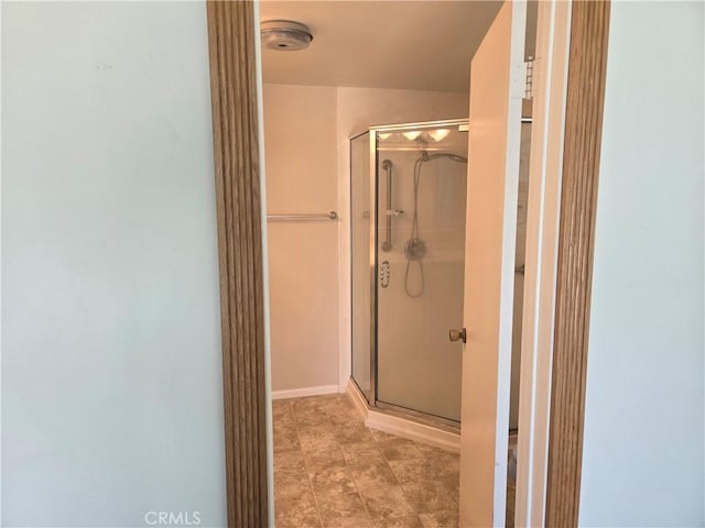 13511 Epping Way, Tustin, CA 92780 - bathroom featuring a shower stall, tile patterned flooring, and baseboards