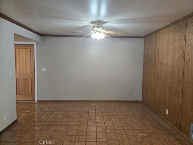 13511 Epping Way, Tustin, CA 92780 - spare room with a ceiling fan, wooden walls, crown molding, and baseboards