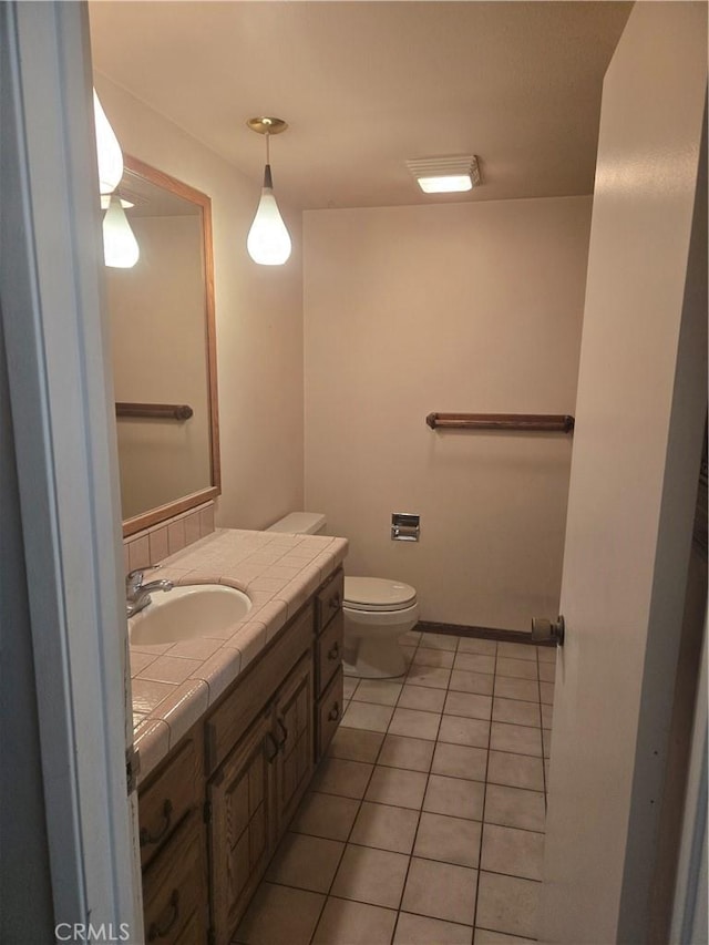13511 Epping Way, Tustin, CA 92780 - bathroom with toilet, tile patterned flooring, and vanity