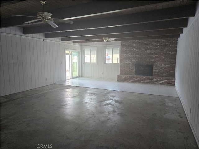 13511 Epping Way, Tustin, CA 92780 - unfurnished living room featuring concrete floors, beam ceiling, a brick fireplace, wooden walls, and ceiling fan