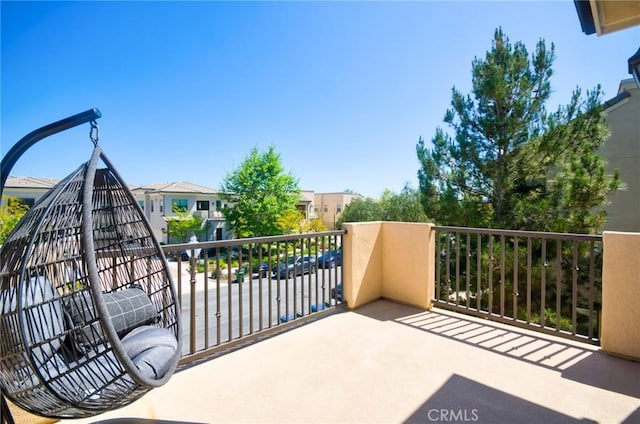 balcony featuring a residential view