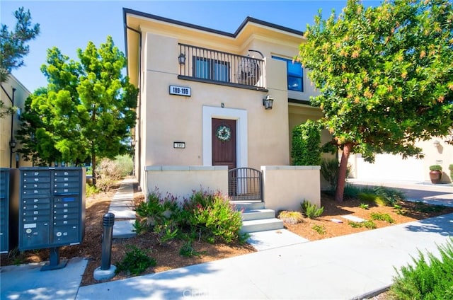 view of front of house featuring stucco siding