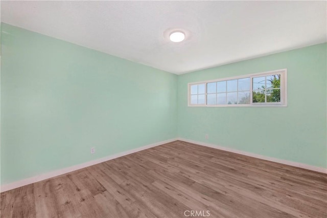 3882 Dwiggins St, Los Angeles, CA 90063 - unfurnished room with wood finished floors and baseboards
