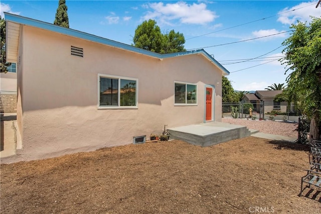 3882 Dwiggins St, Los Angeles, CA 90063 - back of house with stucco siding