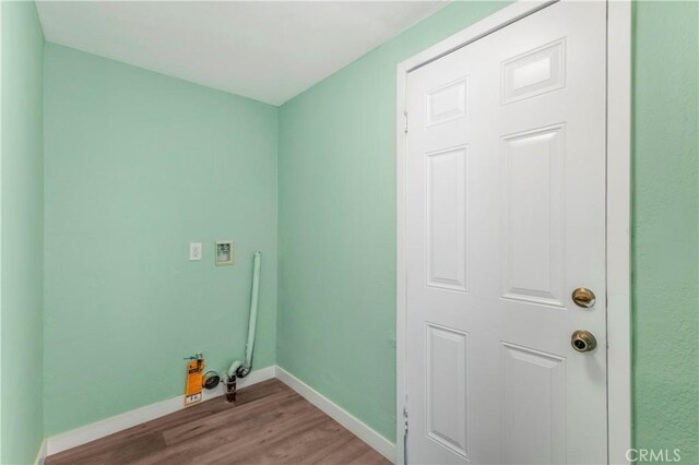 3882 Dwiggins St, Los Angeles, CA 90063 - washroom featuring wood finished floors and baseboards