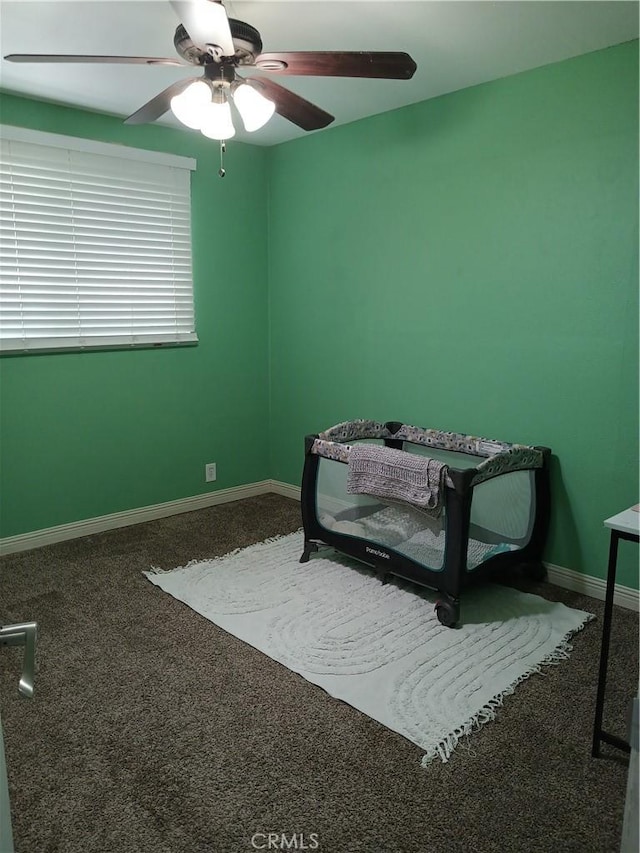 12426 2nd St, Yucaipa, CA 92399 - bedroom with baseboards, a ceiling fan, and carpet flooring