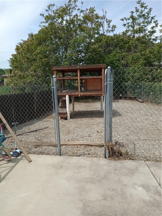 12426 2nd St, Yucaipa, CA 92399 - view of gate featuring fence