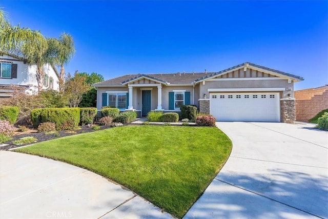 view of front facade featuring an attached garage, a front lawn, stucco siding, and concrete driveway