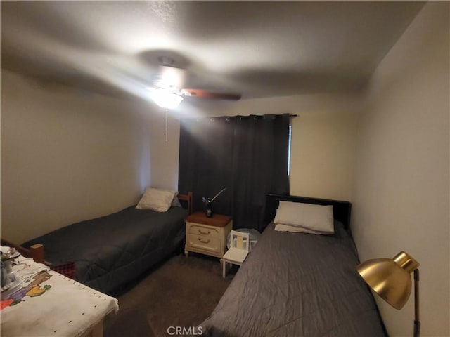 carpeted bedroom featuring a ceiling fan