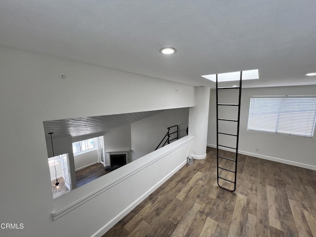 333 Highland Dr, Oxnard, CA 93035 - unfurnished room featuring wood finished floors, a fireplace, and recessed lighting