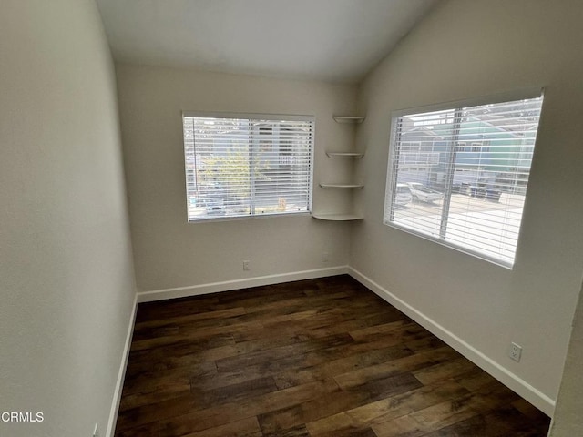 333 Highland Dr, Oxnard, CA 93035 - unfurnished room featuring dark wood-type flooring and vaulted ceiling