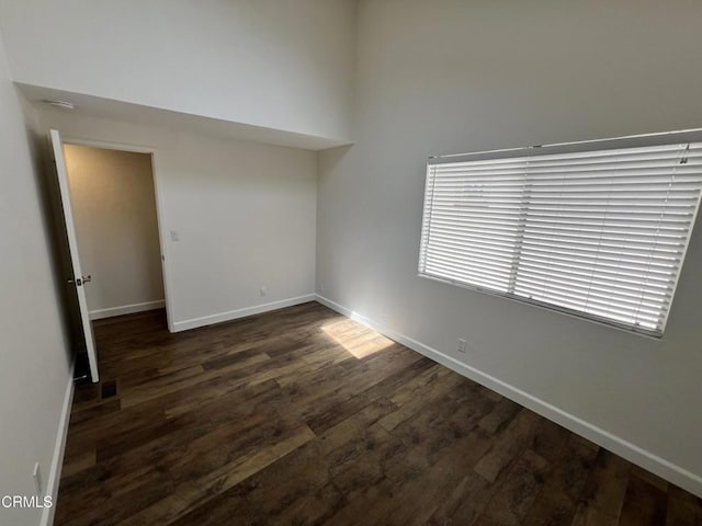333 Highland Dr, Oxnard, CA 93035 - spare room featuring dark wood-type flooring and baseboards