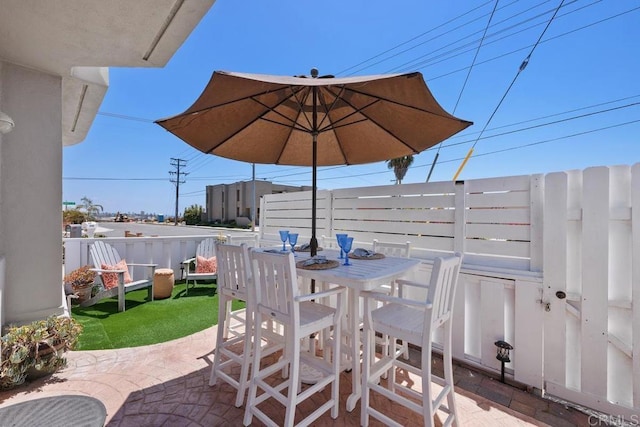 view of patio / terrace with fence and outdoor dining space