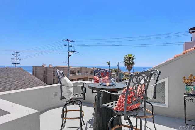 view of patio with a balcony