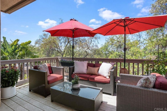 deck featuring outdoor lounge area