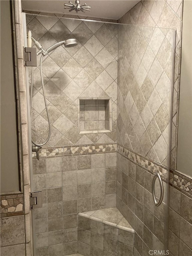 full bath featuring a stall shower