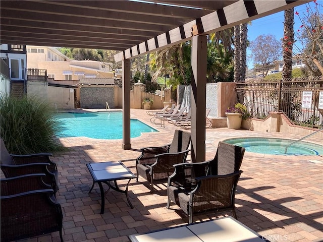 pool with a patio, a pergola, and a fenced backyard