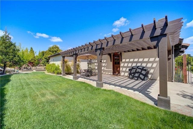 view of yard featuring a patio and a pergola