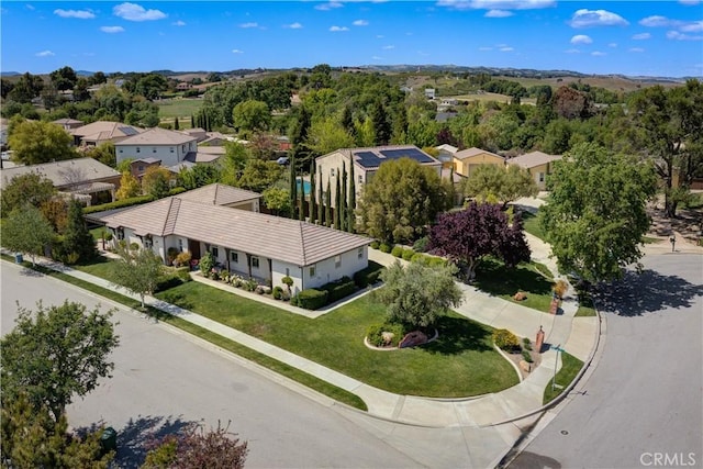drone / aerial view with a residential view