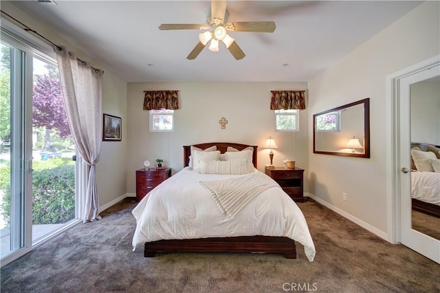 bedroom featuring carpet floors, baseboards, ceiling fan, and multiple windows