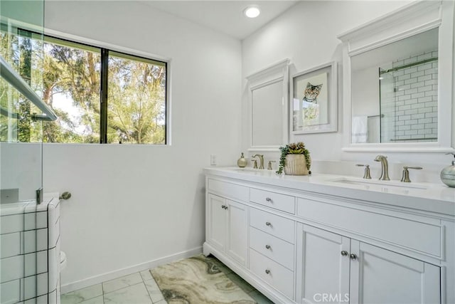 3392 Coy Dr, Sherman Oaks, CA 91423 - full bath with marble look tile flooring, recessed lighting, double vanity, baseboards, and toilet