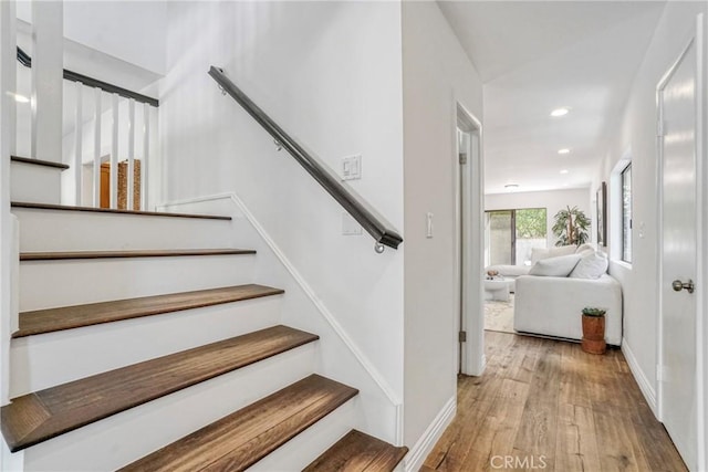 3392 Coy Dr, Sherman Oaks, CA 91423 - stairs featuring wood finished floors, recessed lighting, and baseboards