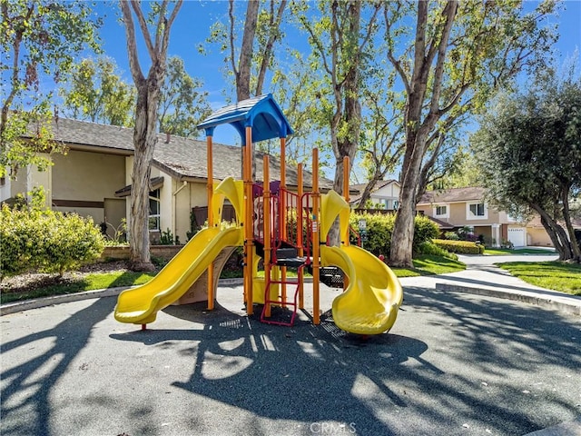 community play area with a residential view