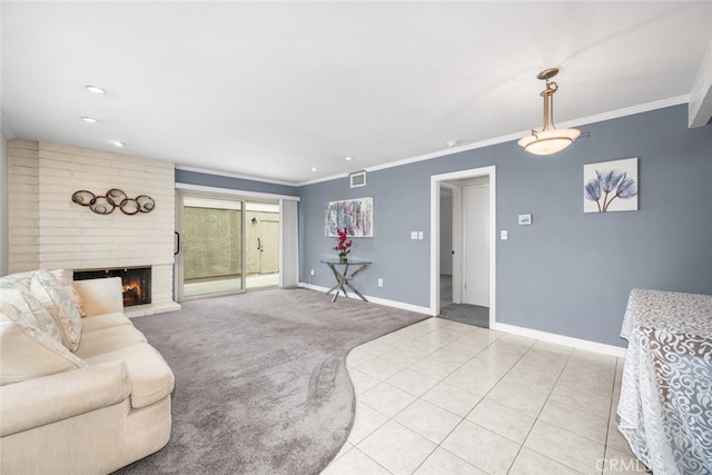 living room with a fireplace, light tile patterned floors, baseboards, ornamental molding, and light carpet